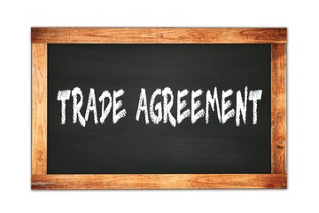 TRADE  AGREEMENT text written on wooden frame school blackboard.