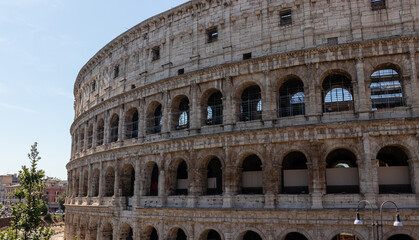 Roman colosseum close up. An ancient arched structure on a sunny day.