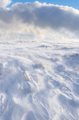 A mountain slope covered with a layer of snow. Trapped in motion.