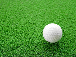 Golf ball on synthetic artificial turf