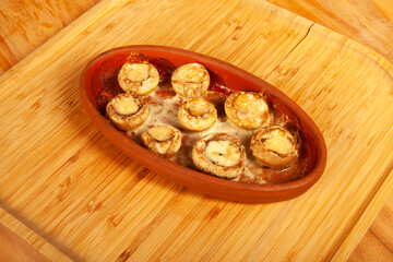 Baked white mushrooms in butter
