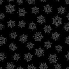 Doodle gray mandala in the shape of snowflakes on black background. Suitable for wrapping paper, wallpaper, textile.