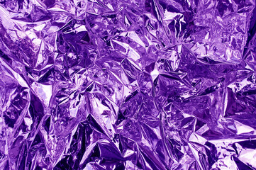 Abstract texture crumpled purple foil paper
