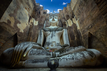 Wat Si Chum in Sukhothai Historical Park is a historic site big statue of Buddha Phra Achana Sukhothai in asia Thailand. This is public property, no restrict in copy or use.