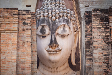 Wat Si Chum in Sukhothai Historical Park is a historic site big statue of Buddha Phra Achana Sukhothai in asia Thailand. This is public property, no restrict in copy or use.