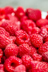 Fresh raspberries, heap of red ripe summer berries