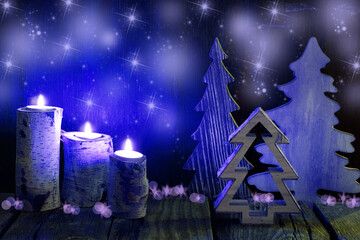 Christmas background with candles and wooden trees, copy space