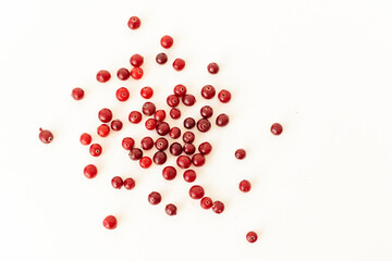 Cranberries on a white background.
