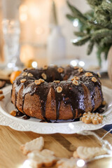 Christmas cupcake on the table. Pie with chocolate and hazelnuts. New Year's dessert.