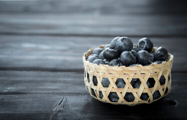 blueberries in a woven bamboo basket