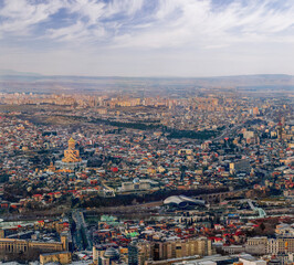 Fototapeta na wymiar Tbilisi, Georgia. Aerial panorama cityscape. Landmarks and old town 