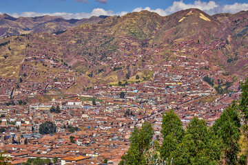 View of the roofs of a city in the mountains