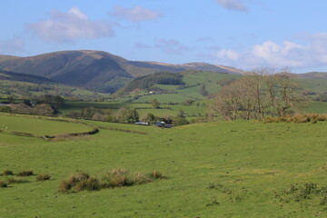 A rural scene near Dylife, Powys, Wales, looking towards the mountains of Snowdonia.