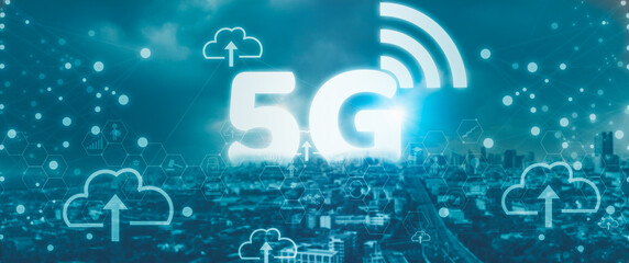 Night view of smart city,with 5G network and wifi symbol cover area urban,concept of futuristic fast communication and modern convenience,and connectivity Every device with internet of things (iot)