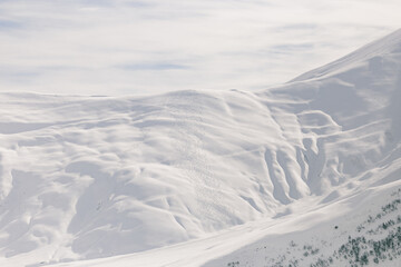 Snow mountains in Georgia. Ski resort Gudauri, Georgia , beautiful sunny day, shining snow, beautiful blue sky, great traveling background image