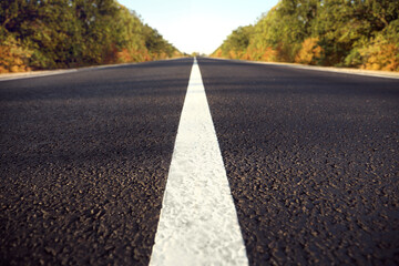 Obraz premium Beautiful view of empty asphalt highway, closeup. Road trip
