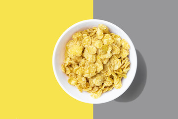 Plate with breakfast cereal on Illuminating and ultimate gray background 2021
