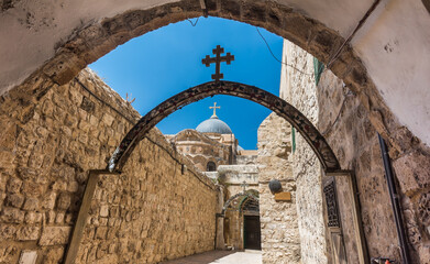 The 9th station of the cross in Via Dolorosa at the entree to the Coptic Orthodox Patriarchate, St....