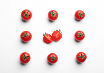 Naklejka na ściany i meble Fresh ripe cherry tomatoes on white background, top view