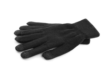Black woolen gloves on white background. Winter clothes