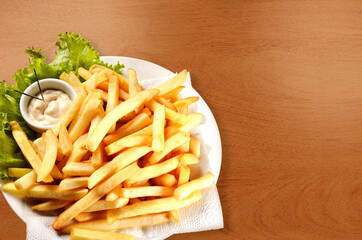 portion of french fries served on the table