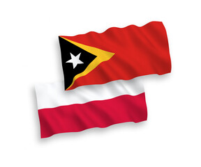 Flags of East Timor and Poland on a white background