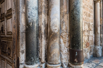 Old pillars of entrance to the Church (right side) of the Holy Sepulchre, also called the Church of...