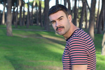 Attractive young man with retro mustache 