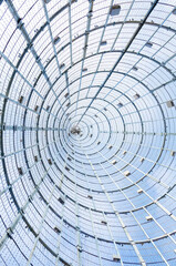 Spiral of metal mesh goes to the sky