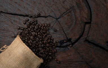 Coffee beans in the sack And all on the old wooden floor