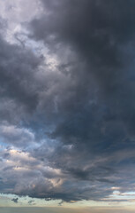 Fantastic thunderclouds, vertical panorama
