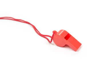 Orange blow whistle for a sport on a white