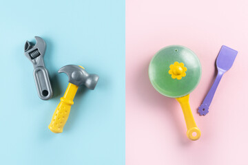 Gender stereotypes concept - female and male toys on pink and blue background, flat lay