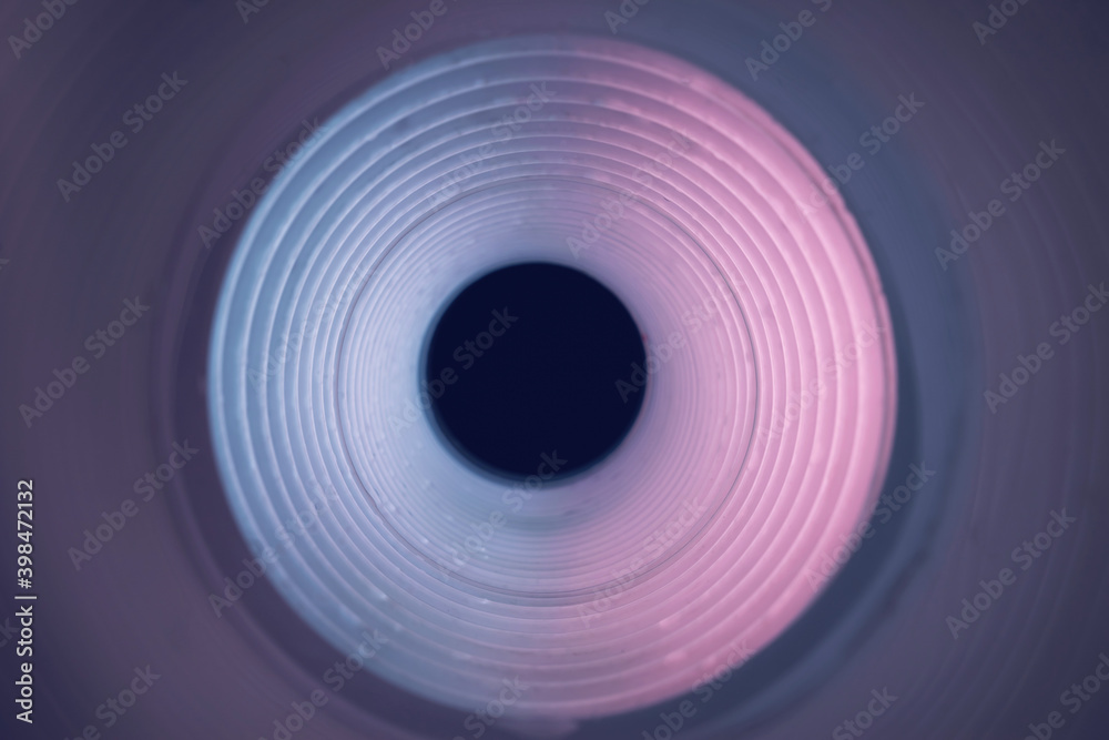 Aufkleber Beautiful round abstract pink tunnel with color light on a background pattern textured ford design.