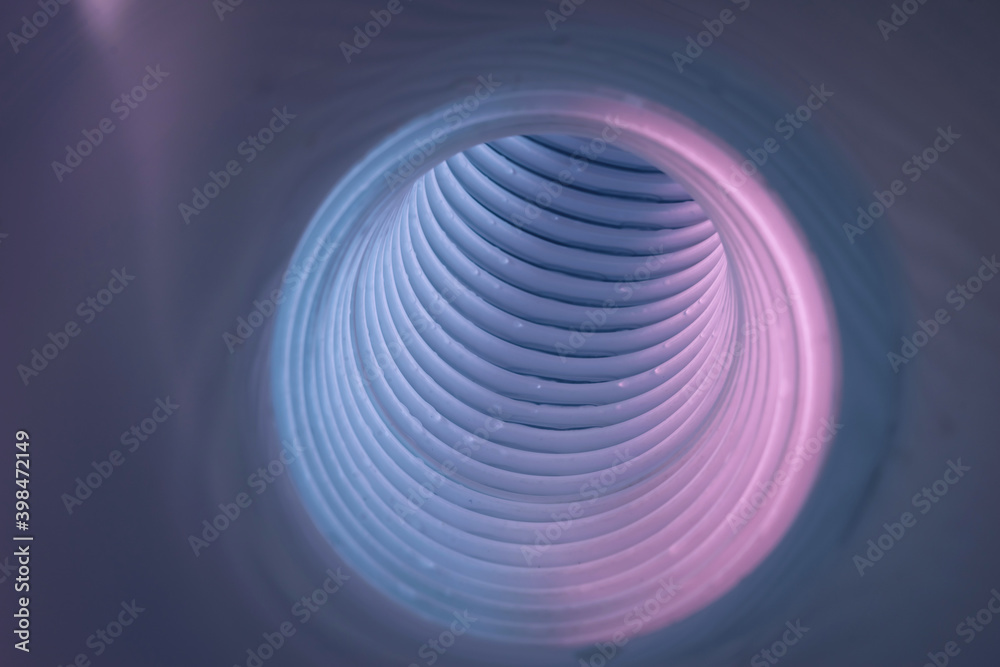 Poster beautiful round abstract white-gray tunnel with color light on a background pattern textured ford de