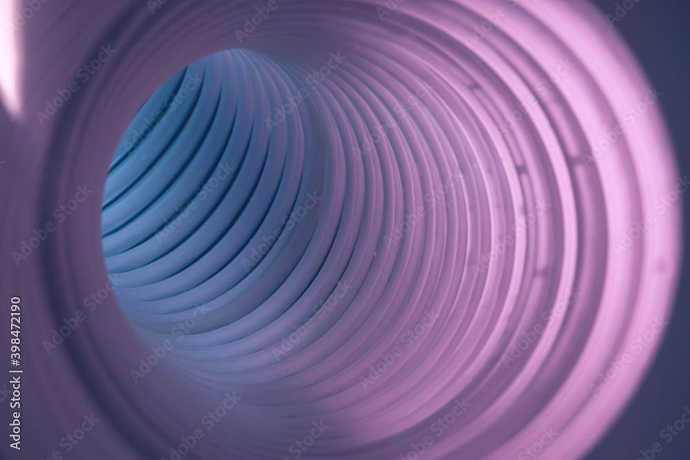 Poster Beautiful round abstract gray tunnel with color light on a background pattern textured ford design.