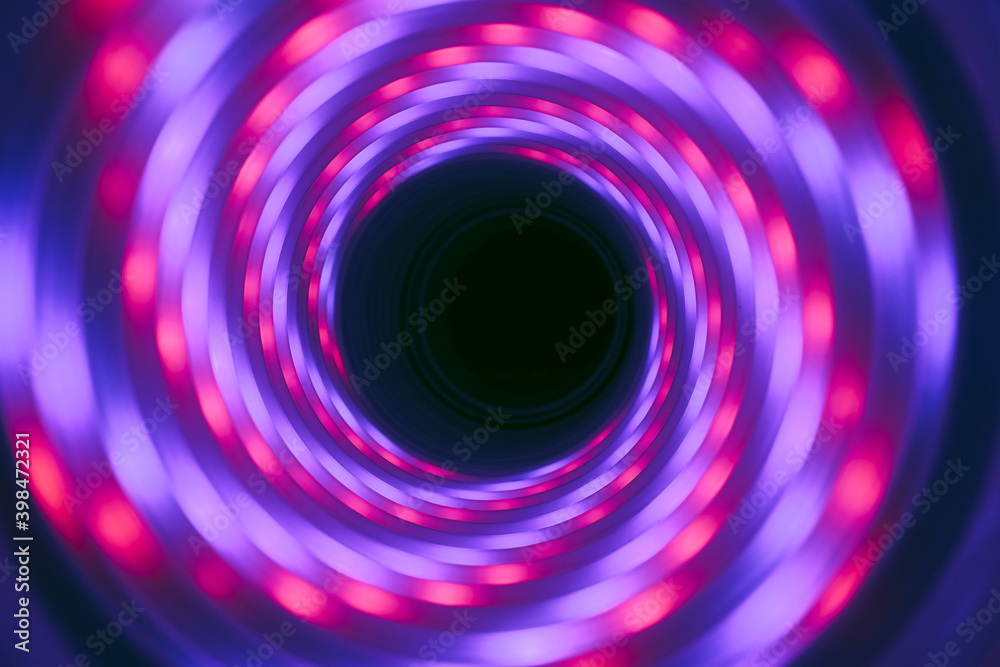 Aufkleber Beautiful abstract swirl tunnel with pink and blue neon light on a background pttern textured for deisgn.