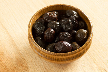 a plate of black olives