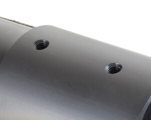 Rifle receiver holes for mounting a scope base