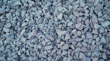Granite gravel texture. Crushed stone close up.