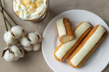 Coffee with croissants and cotton flowers