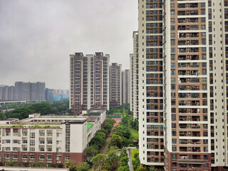 View of the quarter with residential buildings, school and kindergarten. Apartment buildings. Guangzhou. Guangdong. China. Asia