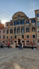 Fototapeta na wymiar Venice cityscape, Campo S Anzolo square and leaning campanile church tower. Italy