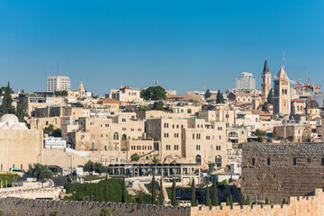 Naklejka premium Historic buildings and skylines, and the wall of old city of Jerusalem on the top of Temple mount, View from Mount of Olives.