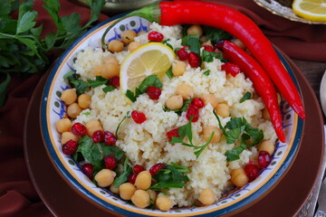 Eastern dish couscous with pomegranate and chickpeas