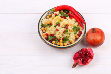Eastern dish couscous with pomegranate and chickpeas