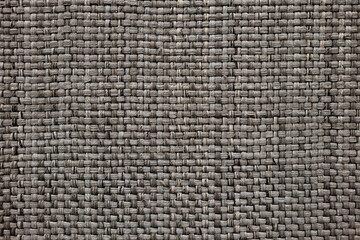 Gray knitting wool  fabric fibers texture for background, wool, tweed, melange cloth, closeup fiber weave. Handmade weave fabric wool theater curtain 