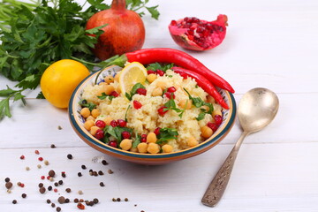 Eastern dish couscous with pomegranate and chickpeas