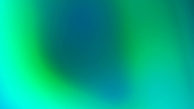 Light green and blue gradient. Moving abstract bright blurred background