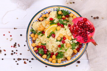 Eastern dish couscous with pomegranate and chickpeas